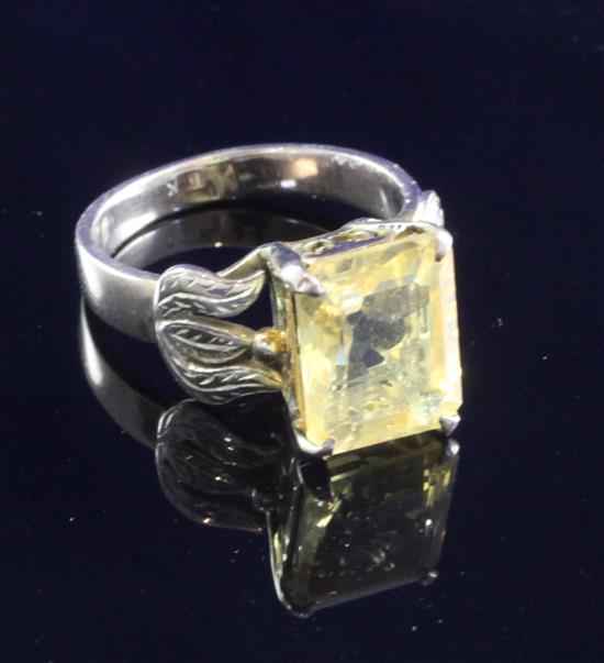 A 14ct gold and solitaire citrine set dress ring, size M.